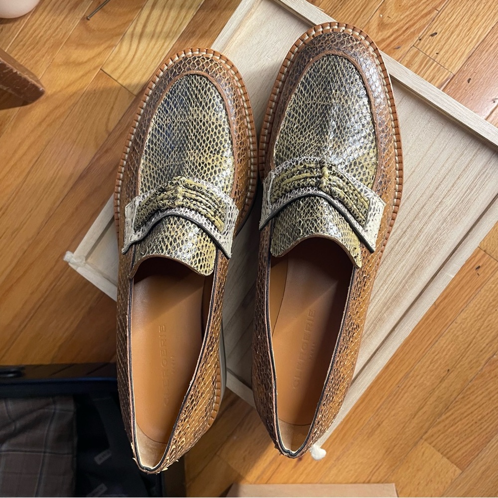 BRAND NEW Robert Clergerie snakeskin platform loafers.